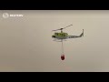 Helicopter battles wildfire in South Africa | REUTERS