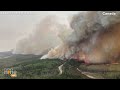 Canada Wildfire | Dangerous Smoke Cloud | Canadian Crews battle wildfire in remote town | News9