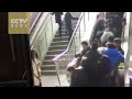 Exclusive Footage: People thrown to the ground by a reversing escalator