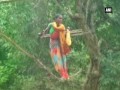 Watch: Villagers make temporary bridge with wires to cross a river