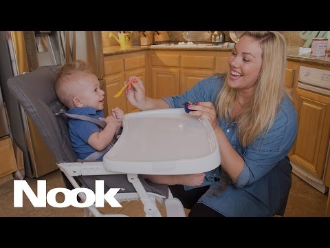Brand new and redesigned, the Nook has all the great features of the original with the addition of a new functionality. The tray not only swings open, it has four adjustable depths to ensure food stays on the tray and not on your child's lap. Brand new and redesigned, the Nook has all the great features of the original with the addition of a new functionality. The tray not only swings open, it has four adjustable depths to ensure food stays on the tray and not on your child's lap.