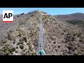 New Tibetan bridge in Italy lets visitors walk 175 meters above the ground