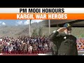PM Modi Honors Kargil War Heroes: Tribute at War Memorial and Address on National Security | News9