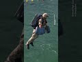 Jet suits fly around British aircraft carrier