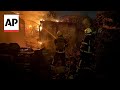 Firefighters battle flames in Kyiv as emergency service says city hit by Russian drone attack