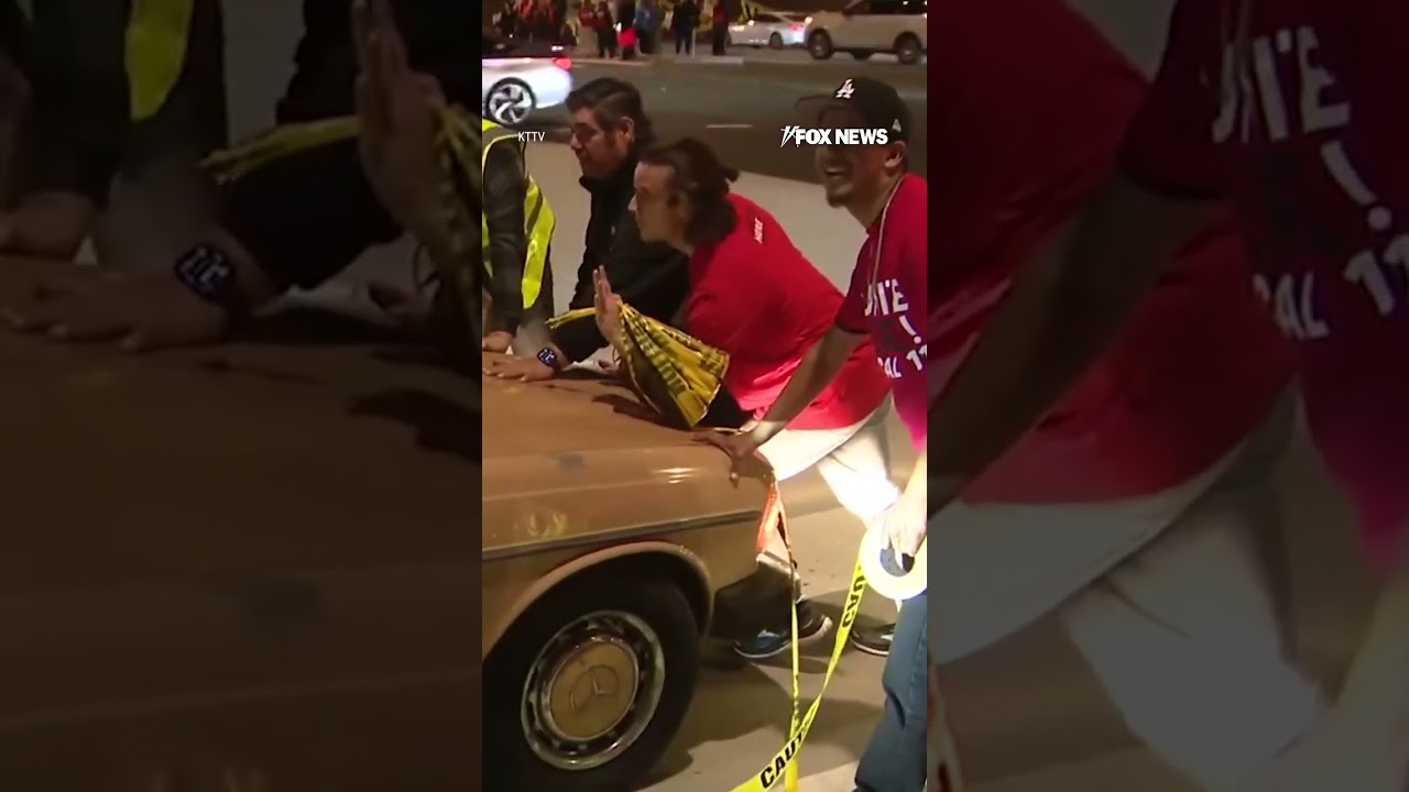 TRAVEL TURMOIL: Hundreds of airline catering workers shut down a key LAX entrance #usa #shorts #LA