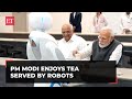 PM Modi enjoys cup of tea served by the robots at Science City, Ahmedabad