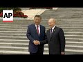 Xi Jinping welcomes Vladimir Putin as Russian president begins visit to China