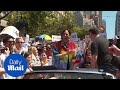 Watch: Kamala Harris dances and takes selfies with people at Pride in CA