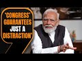 PM Modi Critiques Karnataka Governments Guarantees in TV9 Network Interview | News9