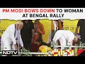 PM Modi Bows Down To Woman During His Rally In West Bengals Birbhum