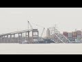 Floating crane arrives at wreckage of Baltimores collapsed bridge  - 00:38 min - News - Video