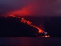 AP : Raw: Lava from Wolf Volcano Boils into Ocean
