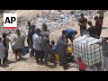 Water distributed in the Muwasi camp for displaced Palestinians in Gaza