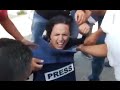 RT - Female reporter hit by stun grenade covering West Bank clashes