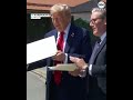 Trump drops papers of US-UK trade deal at G7