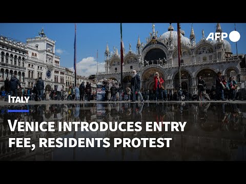 Residents protest as Venice launches five-euro entry fee | AFP
