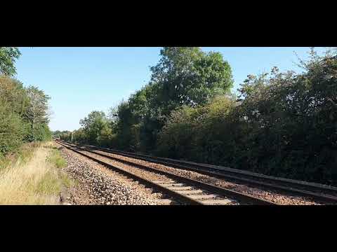EMR Class 156 passing Uttoxeter Park foot crossing with a horn