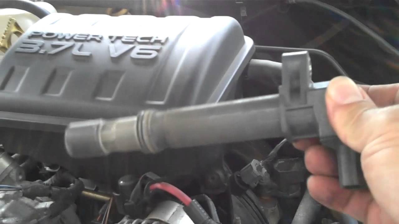 Changing spark plugs jeep liberty 2003