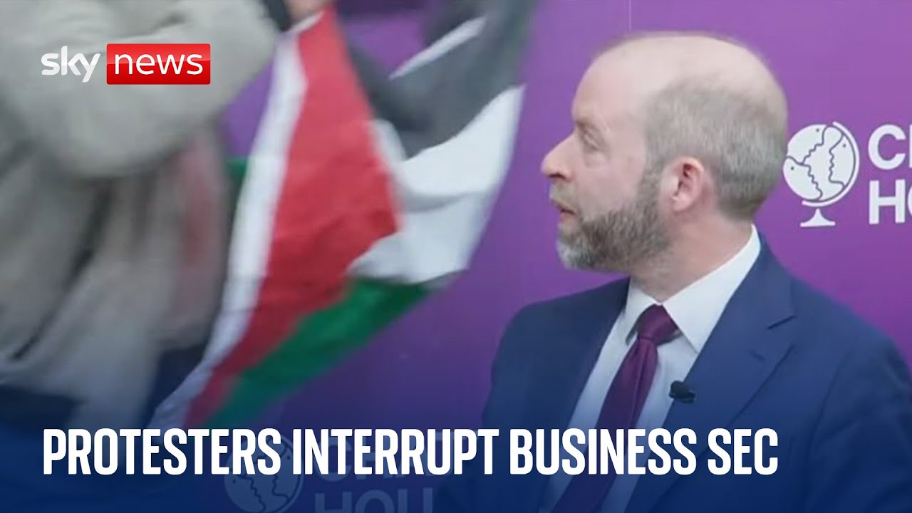 Business secretary interrupted by protesters at trade conference