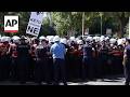 Albania police hold back crowd protesting a resort linked to Jared Kushner