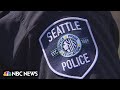 Seattle reaches settlement in fatal 911 caution note error