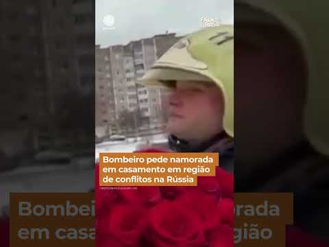 Bombeiro pede namorada em casamento em região de conflitos na Rússia #shorts #falabrasil