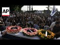 Thousands attend the funeral in Tel Aviv of an Israeli hostage killed on October 7