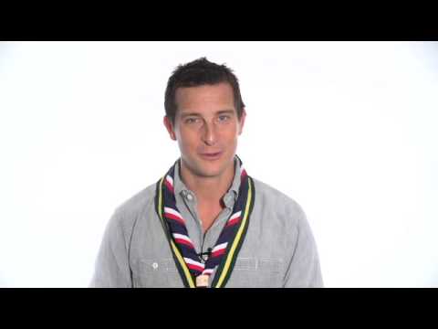 Bear Grylls congratulating Hampshire Scouting ambassador on becoming the first and only person to row an ocean, summit everest and cycle around the world.
