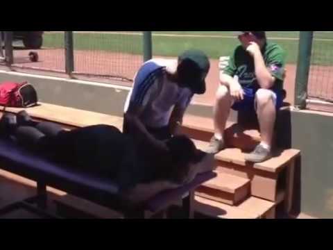 Cork Chiropractor, Dr. Eric Kelly, treating the Irish National baseball team during a trip to NY