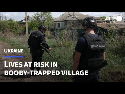 Ukrainian lives at risk in booby-trapped village | AFP