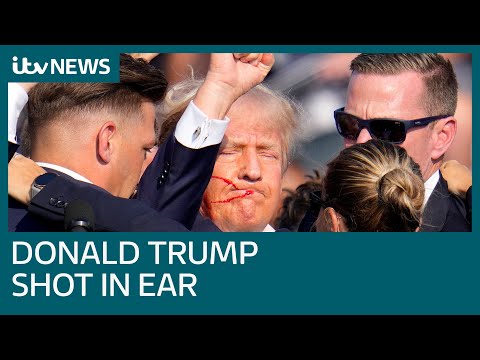 Donald Trump shot in the ear in assassination attempt at rally | ITV News
