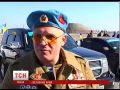 «Беркутовцы» под российскими флагами обстреляли автопробег, есть жертва