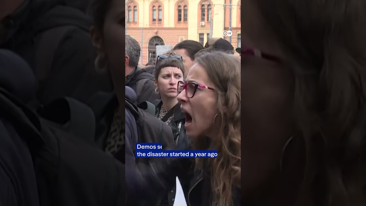Serbians march in anniversary rally for deadly train station collapse | DW News