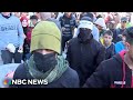 Video shows masked men patrolling Rafah market to keep down prices