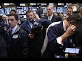Wall Street ends lower, pulled by megacaps, energy