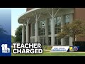 Teacher charged with rape, sex abuse of two students