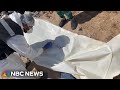 ‘The smell of death is everywhere’: Bodies exhumed from mass graves at Al Shifa Hospital