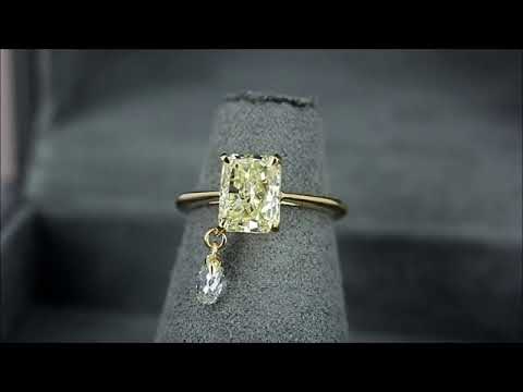 Кольцо с желтым бриллиантом и подвижным элементом 