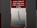 Delhi Air Pollution | Drone Visuals Of Toxic Smog Over Delhis Signature Bridge  - 00:59 min - News - Video