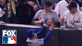 Yankees fan pulls ball out of Mookie Betts' glove in World Series Game 4 | MLB on FOX