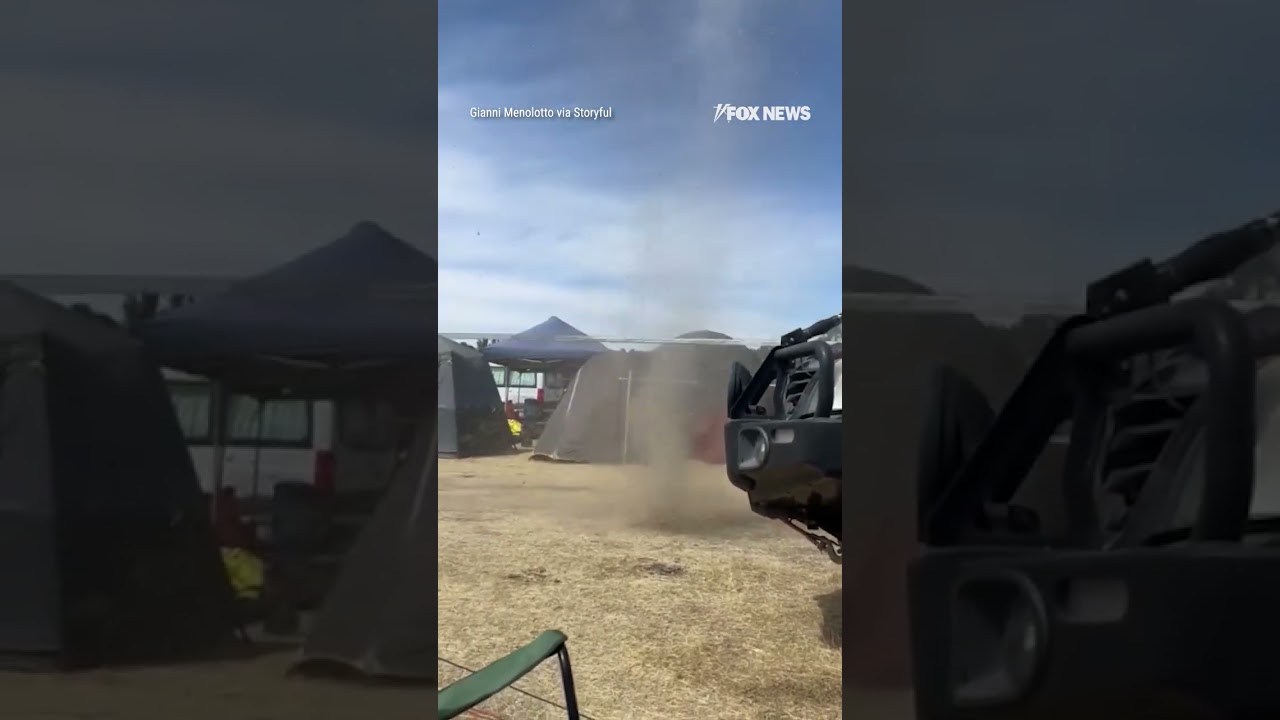 WILD WEATHER TWIST: Powerful dust devil rips through a music festival #shorts
