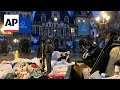 Police remove migrants from central Paris square ahead of Olympics