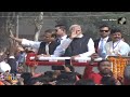 PM Modis Grand Roadshow in Guwahati | Inaugurates Major Projects in Assam | News9  - 01:52 min - News - Video