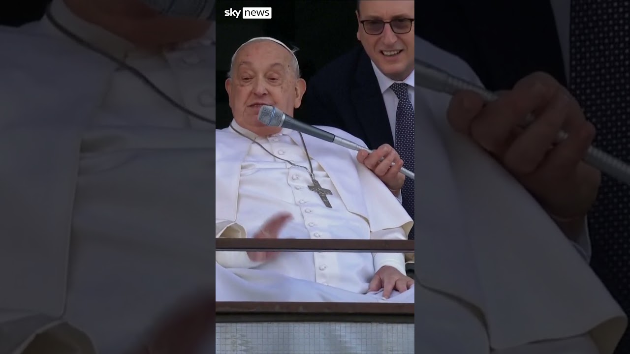 Pope thanks woman with yellow flowers