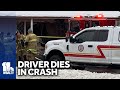 Driver dies after car crashes into business