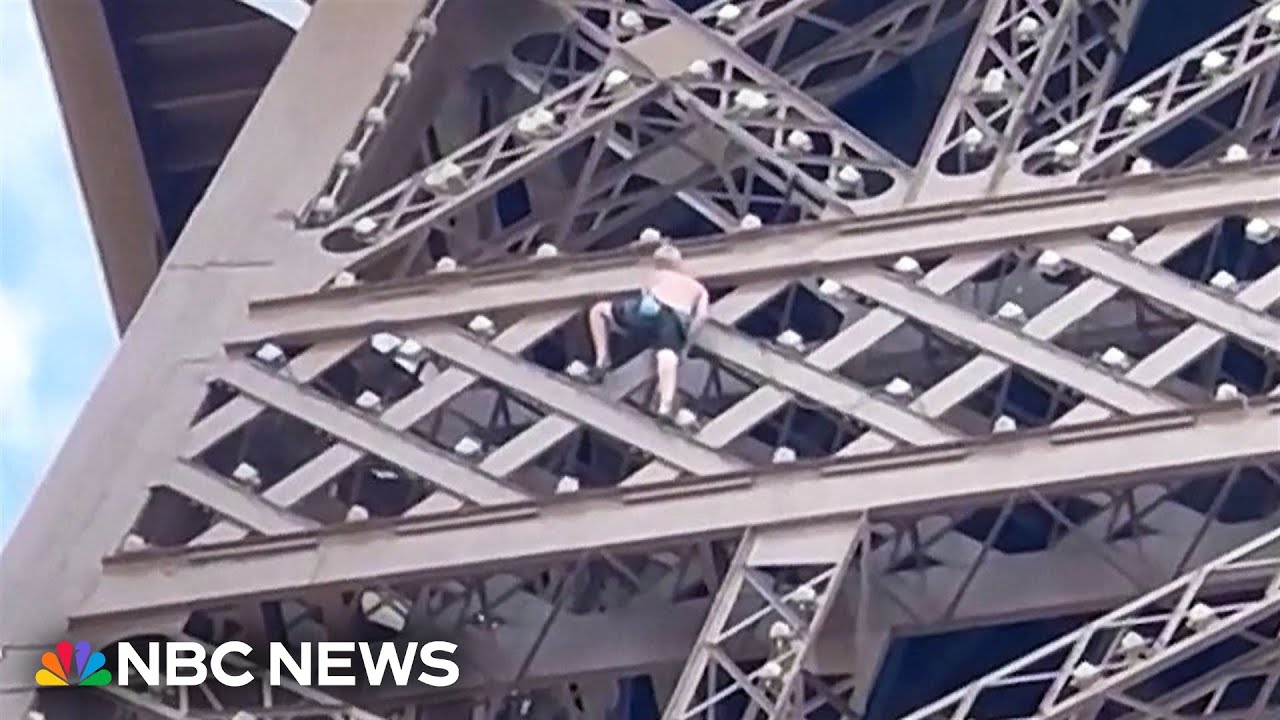 WATCH: Man climbs Eiffel Tower ahead of Olympics closing ceremony