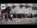 Palestinians turned away from reopened Gaza bank due to lack of cash