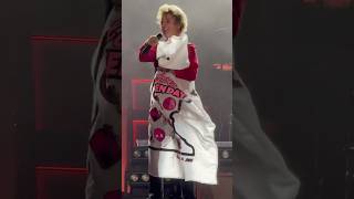 Billie Joe with a flag on stage at Minnesota Yacht Club