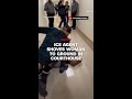 ICE agent shoves woman to ground in courthouse